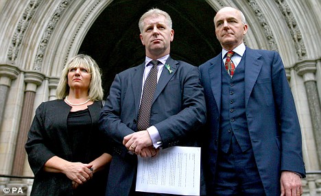 Clarence Mitchell and the McCanns team outside the High Court