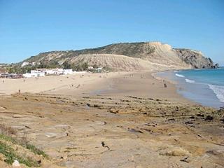 Praia da Luz beach, looking towards Black Rock