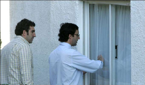 Paulo Rebelo tries to slide open the window to Maddie's bedroom
