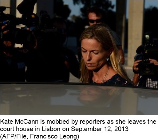 Kate McCann is mobbed by reporters as she leaves the court house in Lisbon on September 12, 2013 (AFP/File, Francisco Leong)