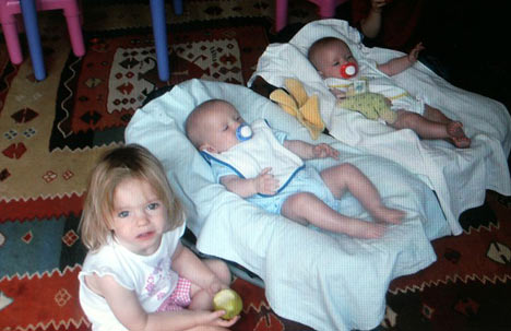 Madeleine McCann with her twin siblings