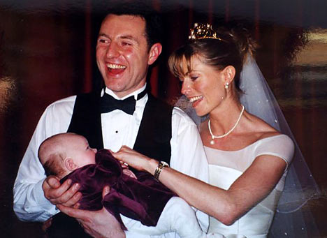Good with children: Gerry and Kate McCann, holding Linda's baby Ellie, Kate's goddaughter