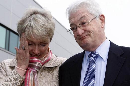 Retired businessman Christopher Tappin, with wife Elaine, outside Heathrow police station