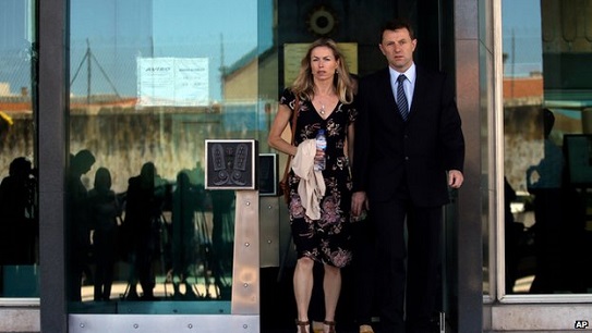 Kate McCann, pictured on Tuesday in Lisbon with husband Gerry, told her son the claims were "silly"