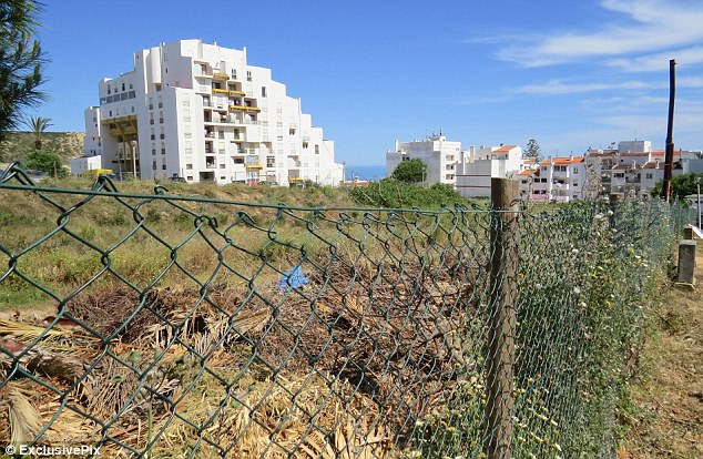 Abroad: Specialist search teams will start by scouring sites across Praia da Luz - including this waste ground near the Ocean Club apartment complex