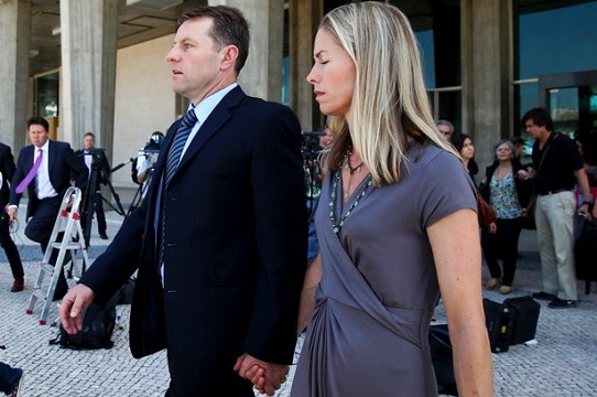 Fresh agony: Couple make their way away from Lisbon courthouse