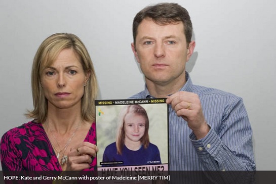 HOPE: Kate and Gerry McCann with poster of Madeleine [MERRY TIM]