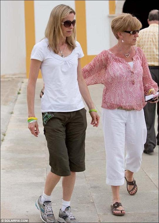 Hopes: Kate McCann, accompanied by her mother Susan Healy, pictured in the Portuguese resort of Praia da Luz, where her daughter Madeline disappeared six years ago