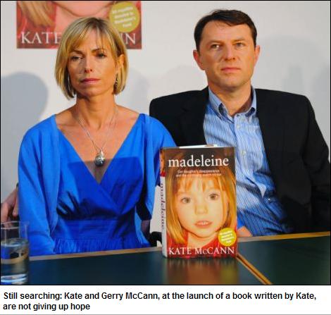 Still searching: Kate and Gerry McCann, at the launch of a book written by Kate, are not giving up hope