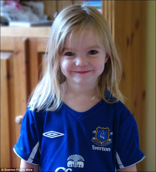 Madeleine in an Everton football shirt before she disappeared. British officers face difficulty in breaking down resistance in Portugal to reopening the case