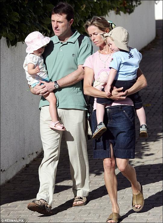 Gerry McCann and Kate McCann hold their twins Sean and Amelie at the Ocean Club Resort in 2007