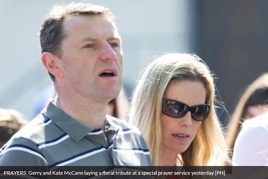 PRAYERS: Gerry and Kate McCann laying a floral tribute at a special prayer service yesterday [PH]