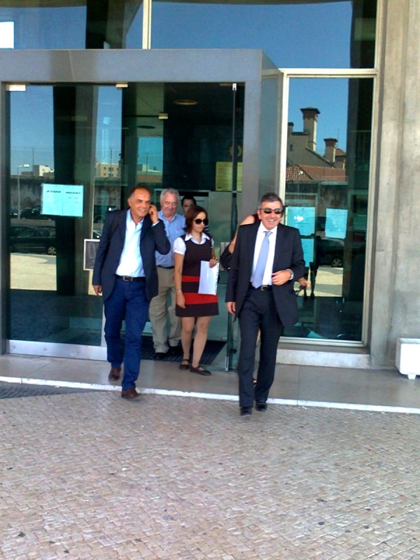 Dr Gonçalo Amaral and Dr Santos Oliveira exit smiling from the Palace of Justice, 20 September 2013