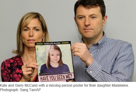 Kate and Gerry McCann with a missing person poster for their daughter Madeleine. Photograph: Sang Tan/AP