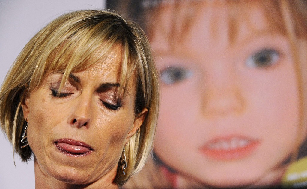 Kate McCann in front of an image of Madeleine