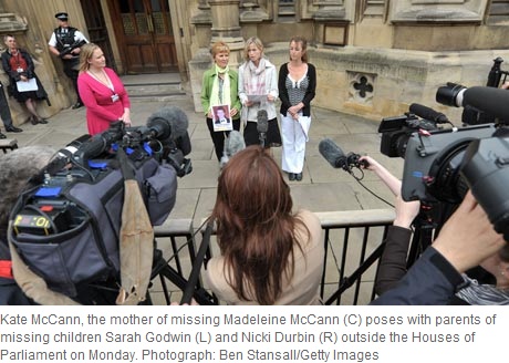 Kate McCann, the mother of missing Madeleine McCann (C) poses with parents of missing children Sarah Godwin (L) and Nicki Durbin (R) outside the Houses of Parliament on Monday. Photograph: Ben Stansall/Getty Images