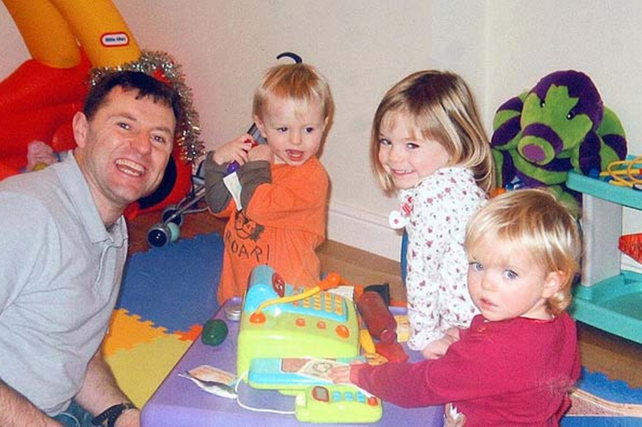 Madeleine McCann with her brother Sean, sister Amelie and dad Gerry