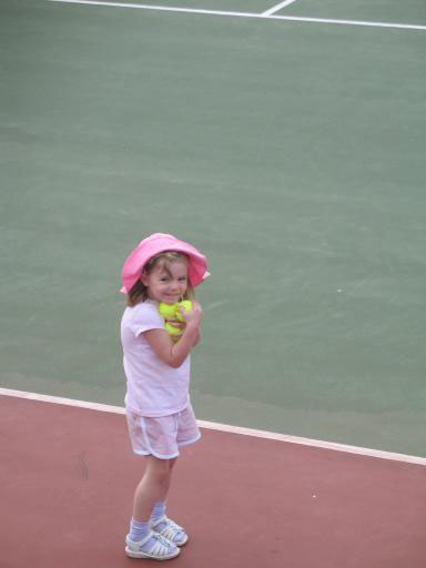 Maddie with tennis balls