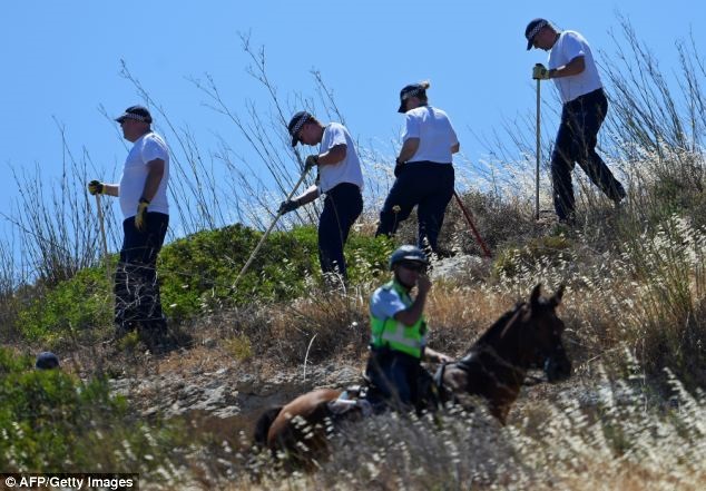 Sniffer dogs were earlier used by officers to search waste ground near to the site where Madeleine vanished