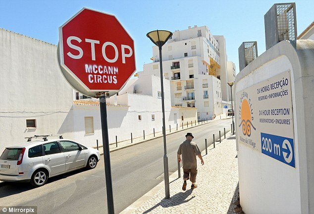 Backlash: Locals in the Portuguese resort where Madeleine disappeared in May 2007 have sprayed graffiti onto road signs so that they read 'Stop McCann circus'