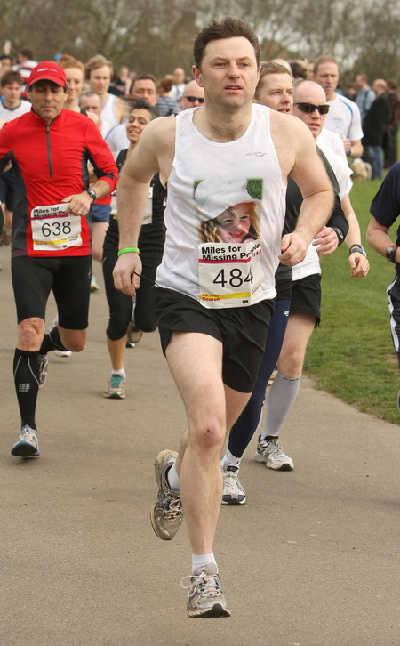 Gerry McCann, the father of Madeline McCann, takes part in the 'Miles for Missing People' charity run in Regent's Park, central London. 02/04/2011