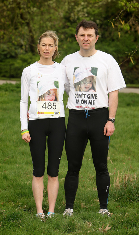 Kate and Gerry McCann, the parents of Madeline McCann, before the start of the 'Miles for Missing People' charity run in Regent's Park, central London. 02/04/2011