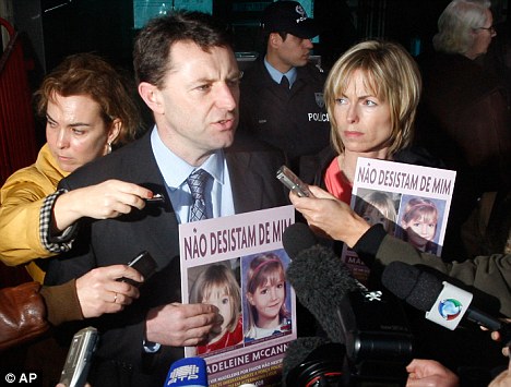 Gerry and Kate McCann, pictured being mobbed by the media this week