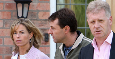 The McCanns and their new spokesman, Clarence Mitchell. Photograph: David Jones/PA