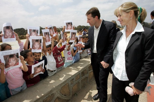 The McCanns are greeted at the National Observatory for Children's Rights by over 100 children
