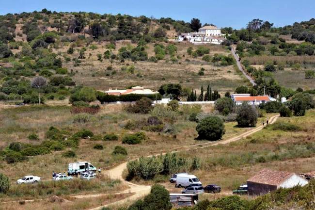 General view of the location where British police officers search the ground for missing British girl Madeleine McCann