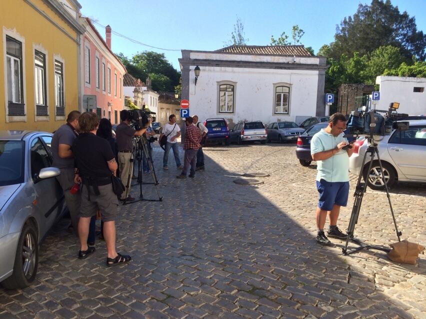 Media gathering outside back entrance to Faro police station awaiting arrival of #McCann case suspects