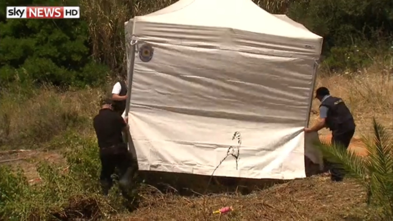 Forensic officers are examining areas of interest under the cover of police tents in connection with Madeleine's disappearance