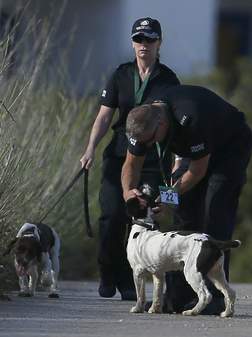 Sniffer dogs helped police officers hunt for clues