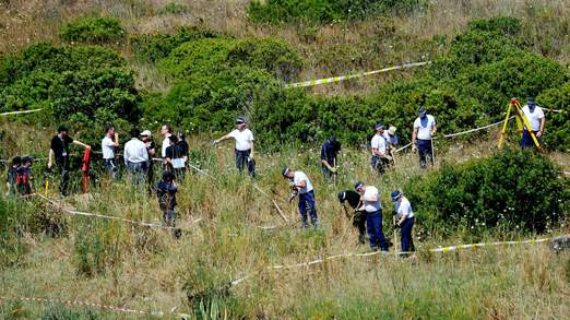 Police have been using sniffer dogs while scouring the scrubland for clues