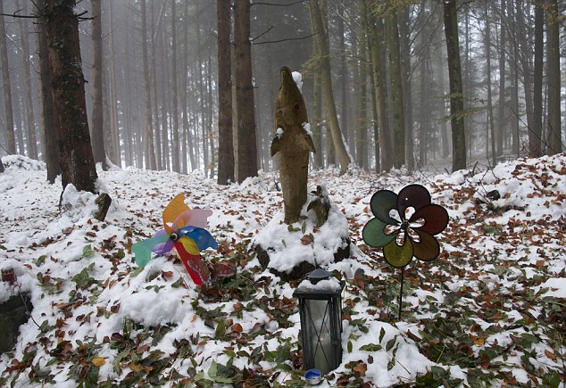 The woodland shrine outside the Swiss town of Oberburon where five-year-old Ylenia Lenhard was abducted and killed by Urs Hans Von Aesch just months after the disappearance of Madeleine McCann